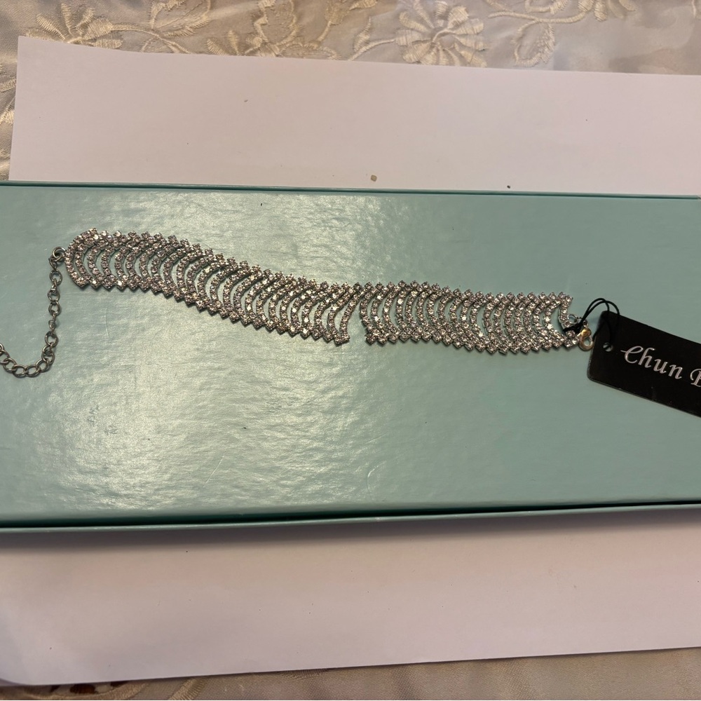 Elegant Silver Rhinestone Bracelet by Chun Po